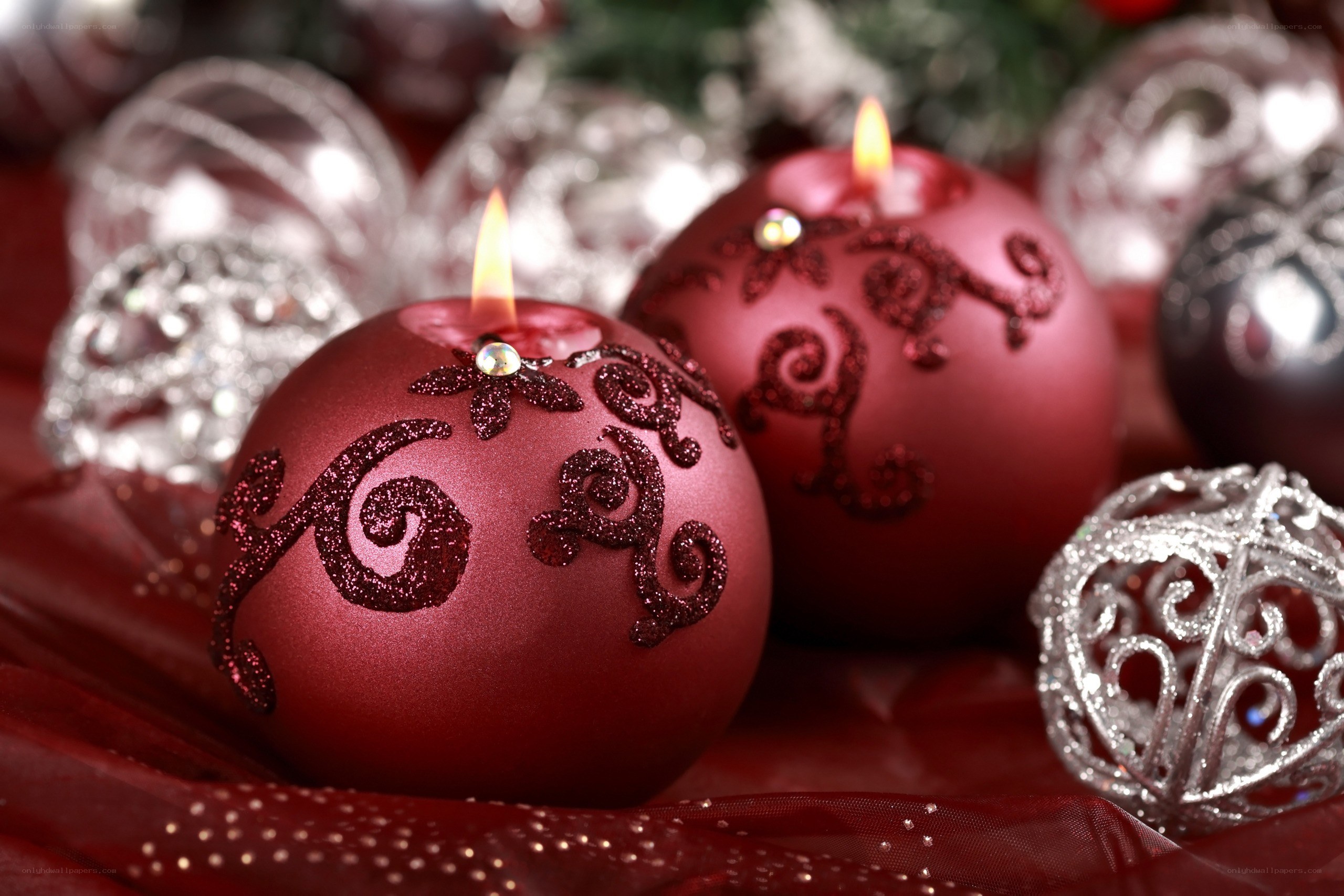 Red candle ornaments with silver decor