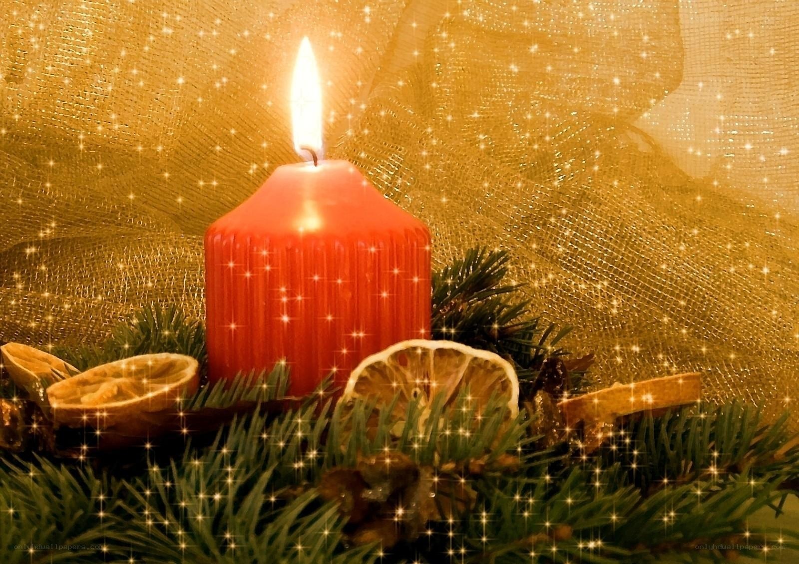 Red candle with festive decor