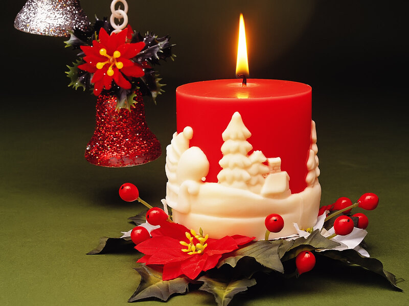 Red Candle with Holiday Decor