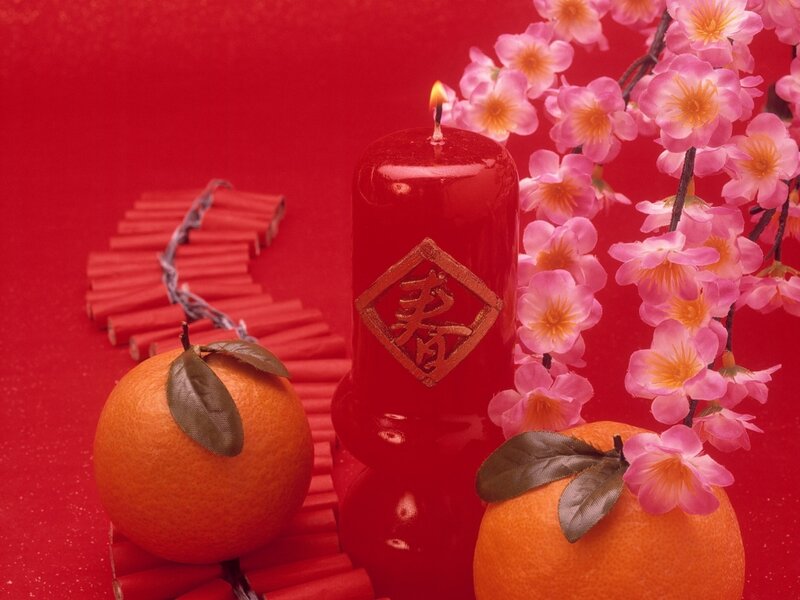 Red Candle with Oranges