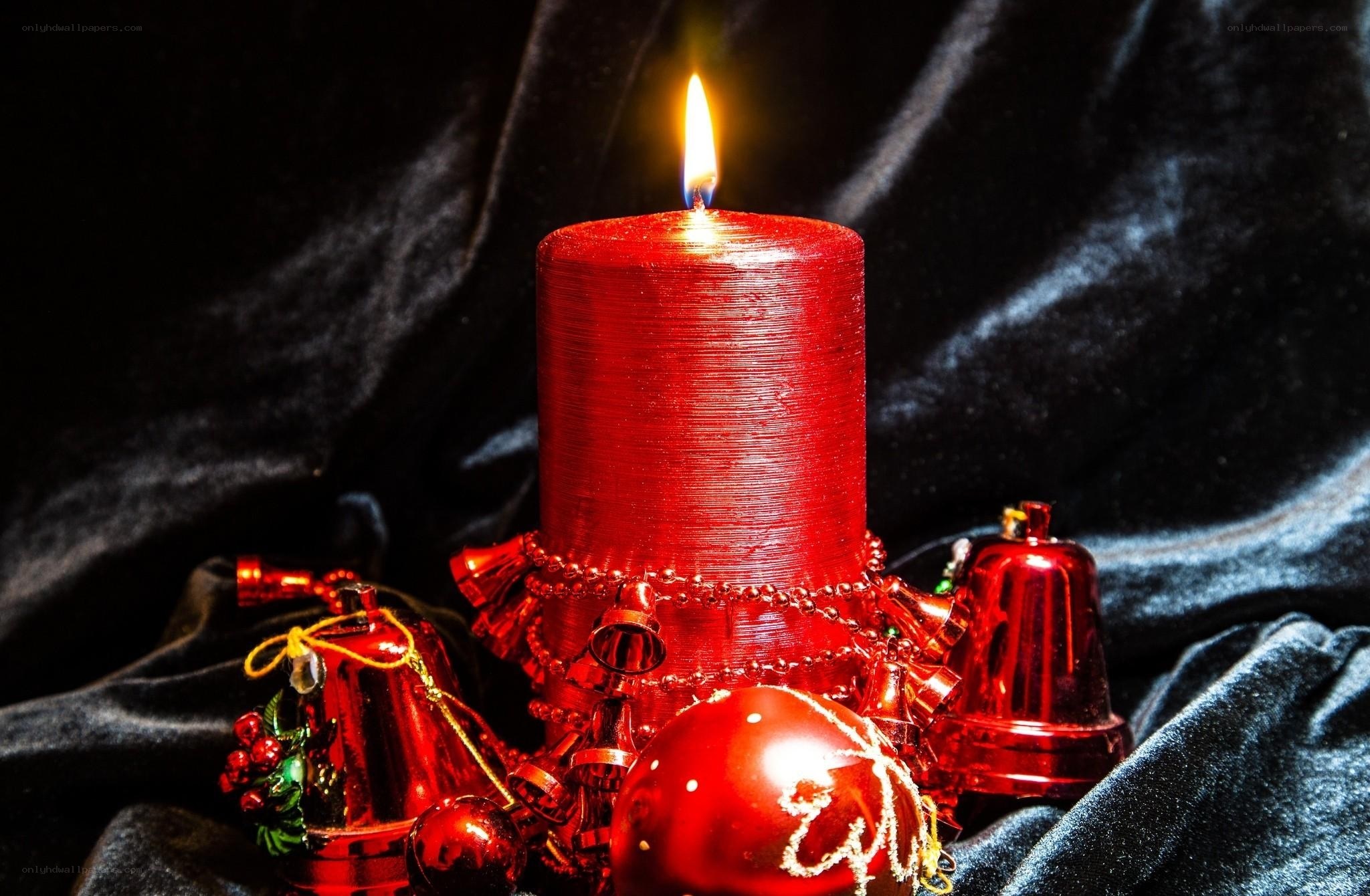 Red candle with ornaments
