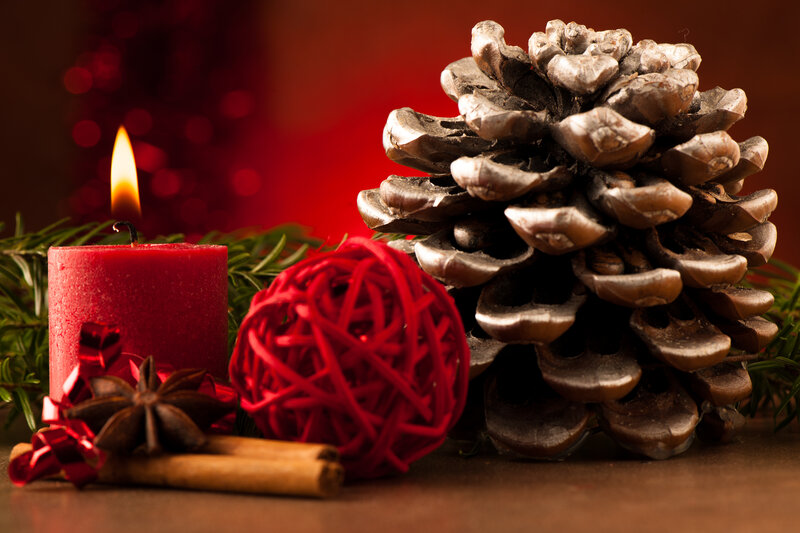 Red Candle with Pinecone