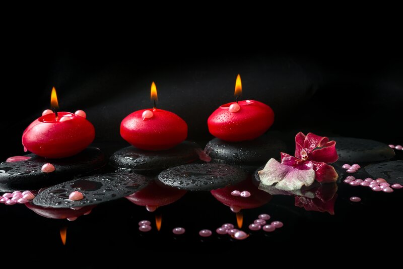 Red Candles on Stones