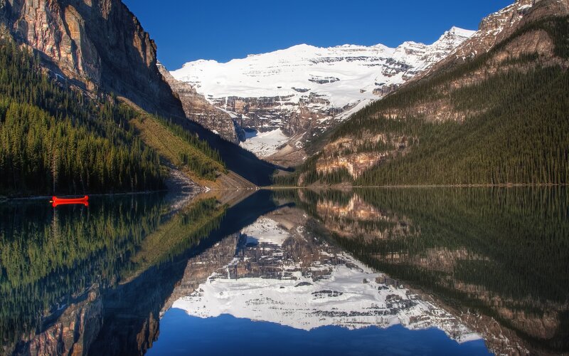 Red Canoe on Lake — Blue, Serene, Afternoon, Photograph, Mountains, Forest, Reflection