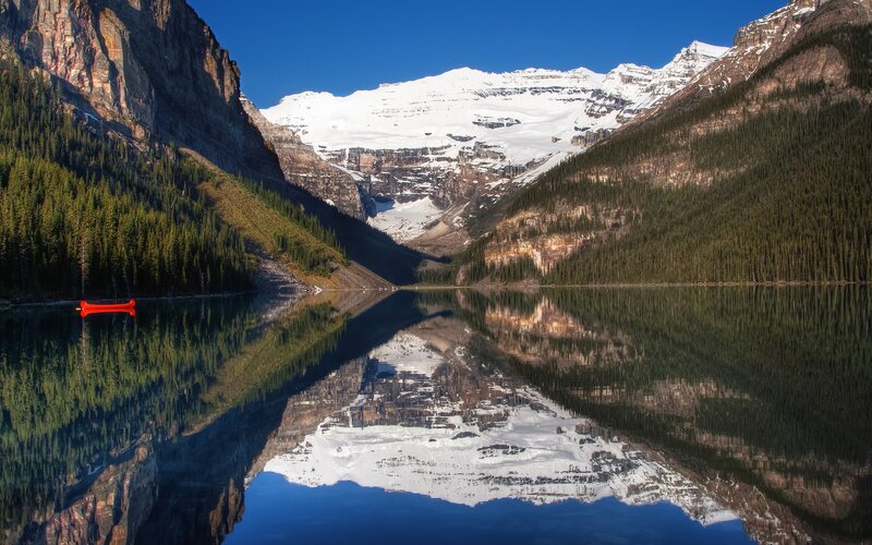 Red Canoe on Lake — Blue, Serene, Afternoon, Photograph, Mountains, Forest