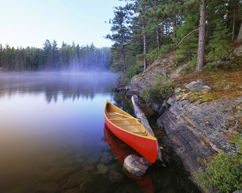 Red Canoe on Lake — Serene