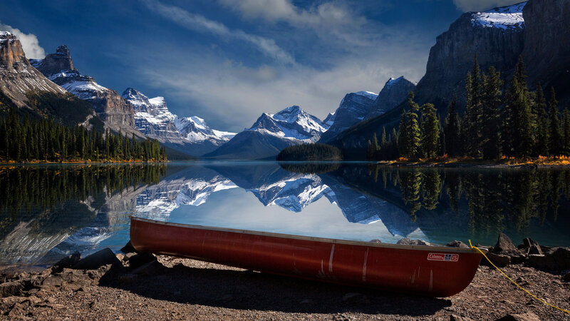 Red Canoe on Shore — Blue