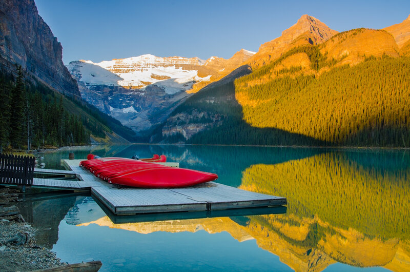 Red Canoes on Dock — Blue