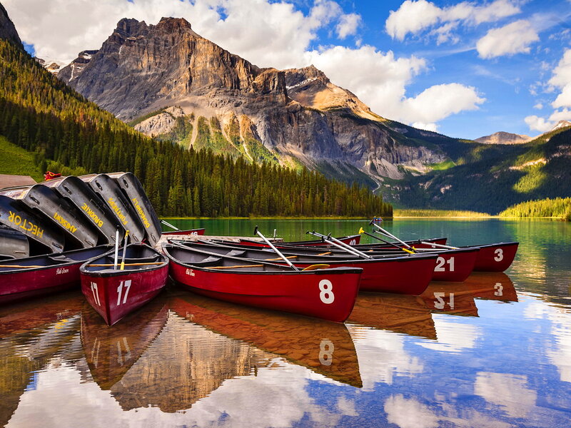 Red Canoes on Lake — Blue, Serene, Afternoon