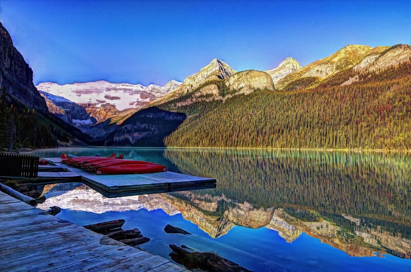 Red Canoes on Lake — Blue, Serene, Morning, Photograph