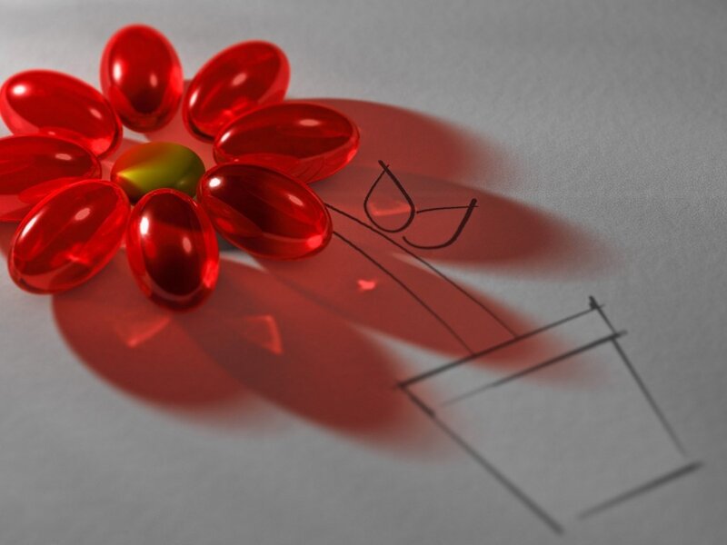 Red Capsules Arranged as Flower