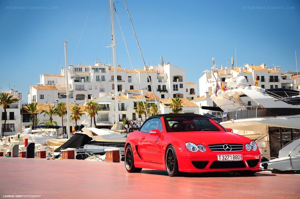 Red car at marina