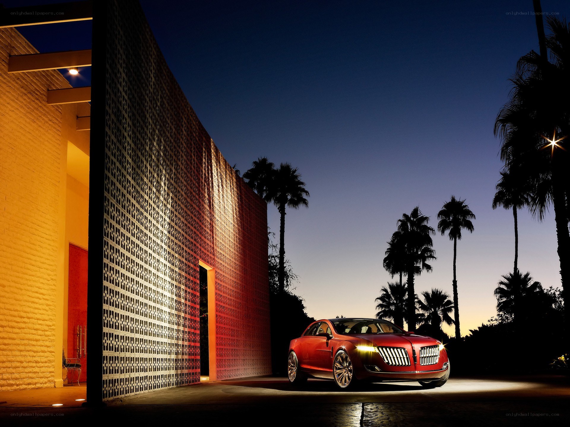 Red car at modern house