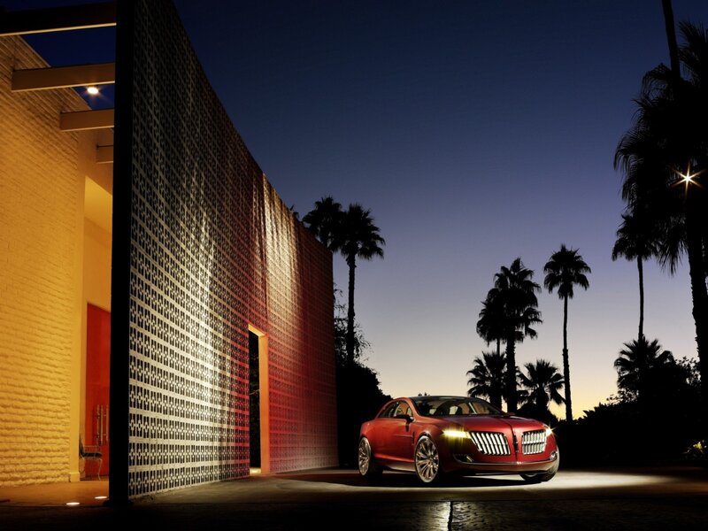 Red car at modern house