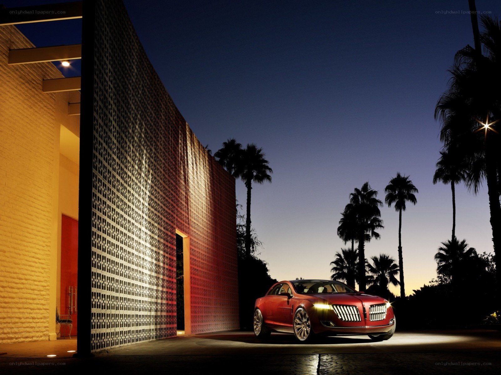 Red car at modern house