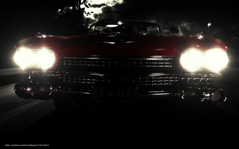 Red car at night