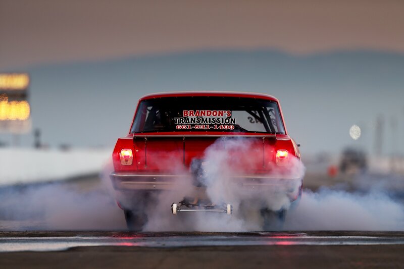 Red car doing a burnout