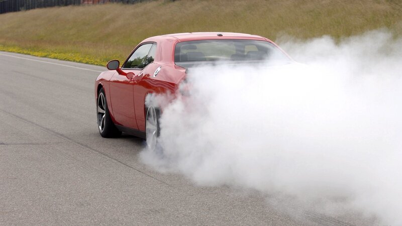 Red Car Doing Burnout — Dramatic