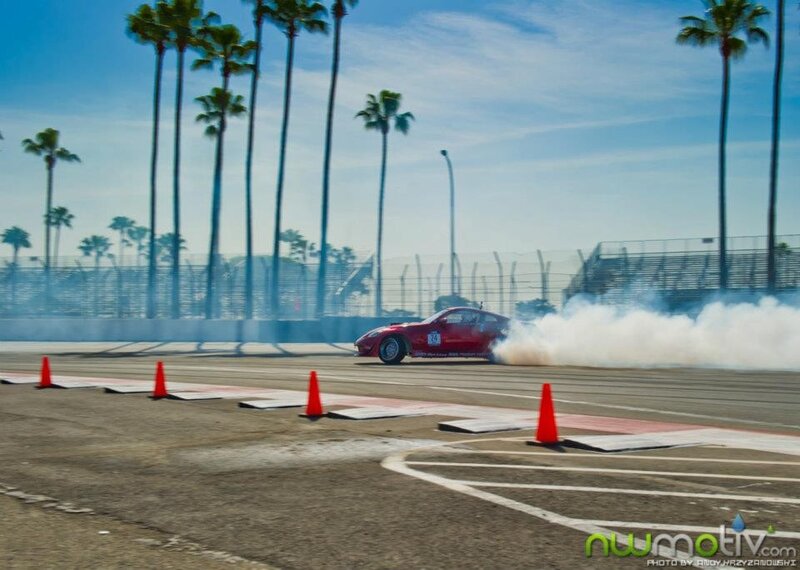 Red Car Drifting — Dynamic, Afternoon, Photograph