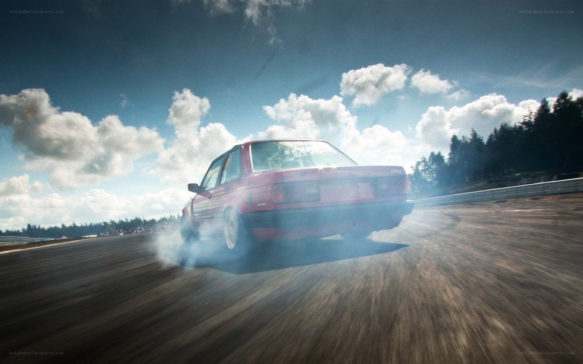 red car drifting on track