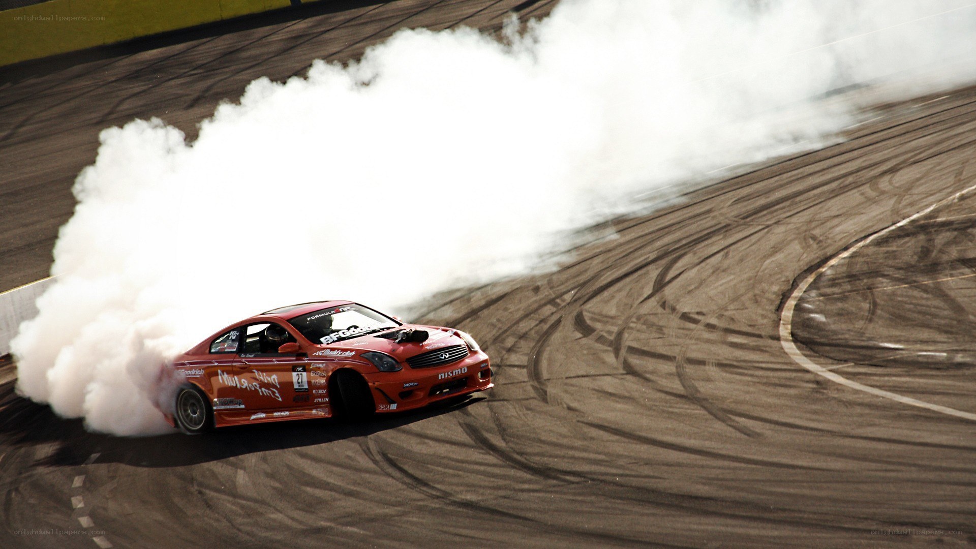 Red car drifting on track