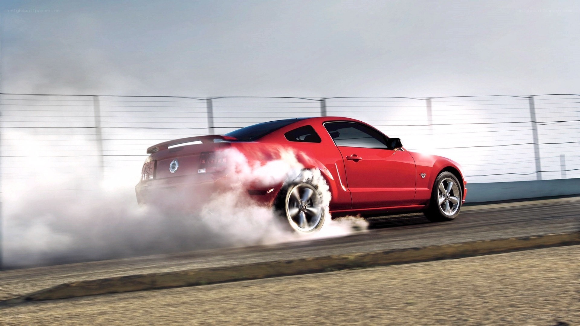 Red car drifting on track
