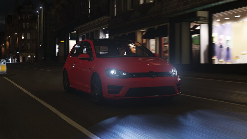 Red Car Driving at Night — Dark