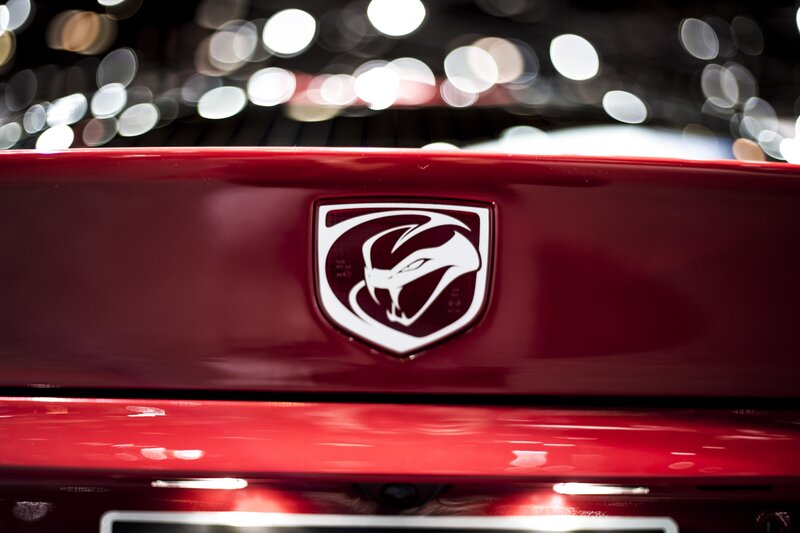 Red Car Emblem — Dramatic