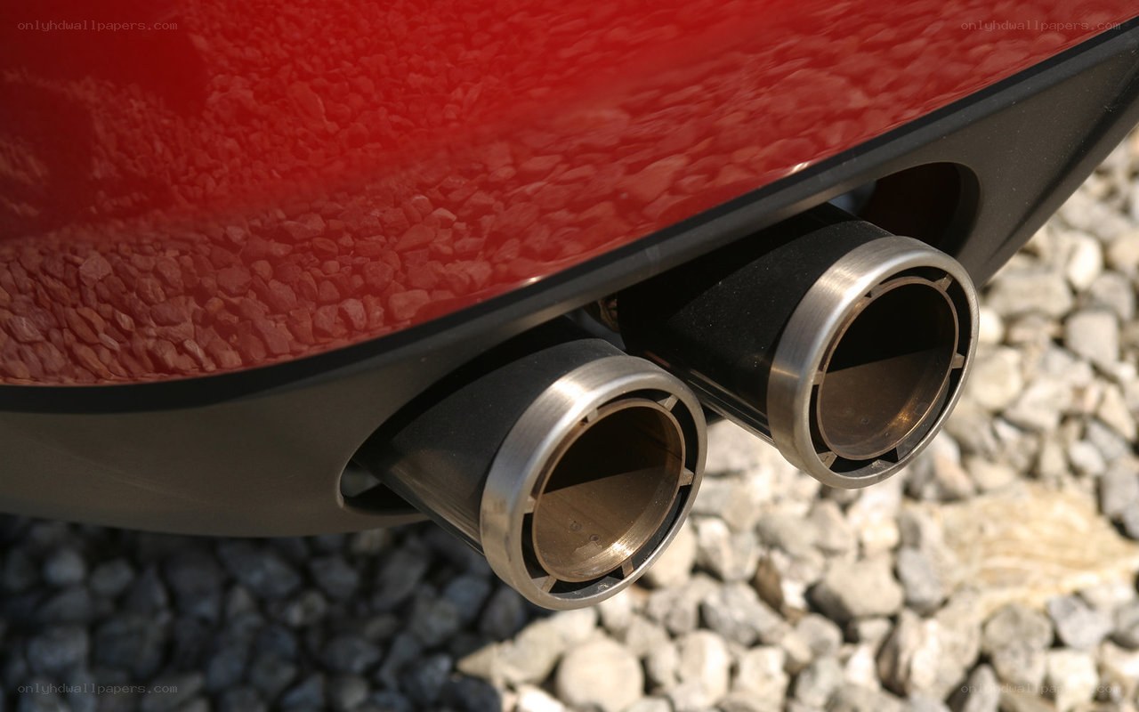 red car exhaust pipes