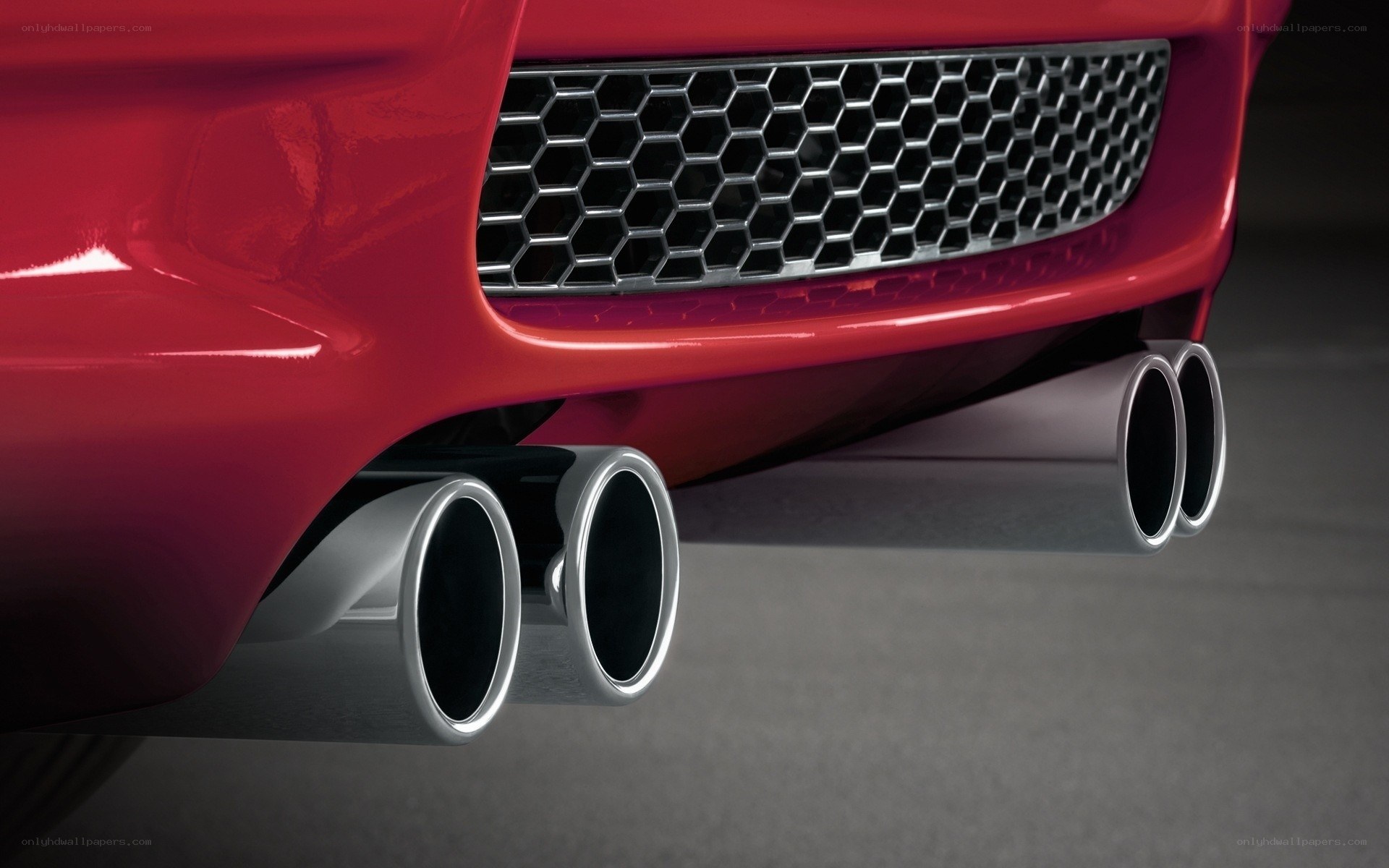 red car exhaust pipes