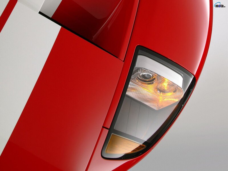 red car headlight close-up