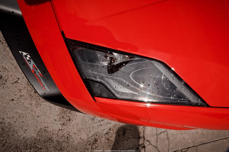 Red Car Headlight — Dramatic, Afternoon