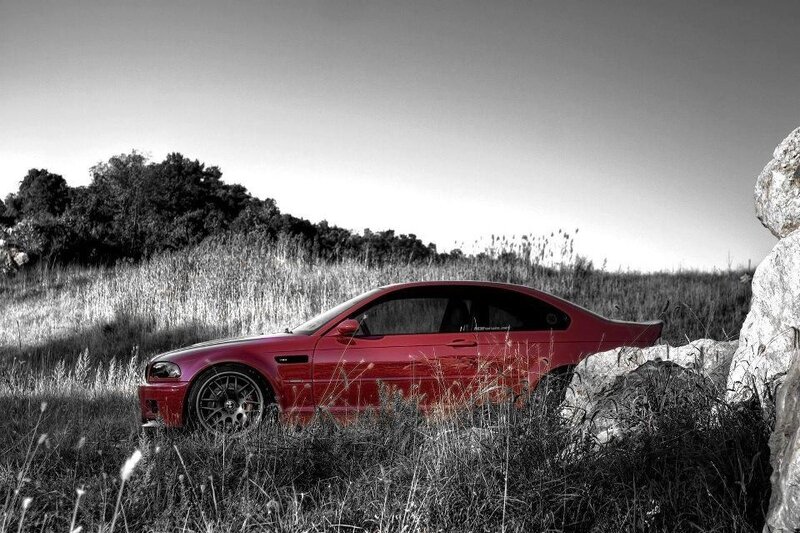 red car in a field