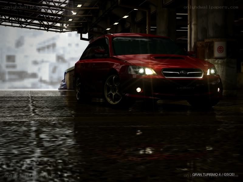 Red car in a garage