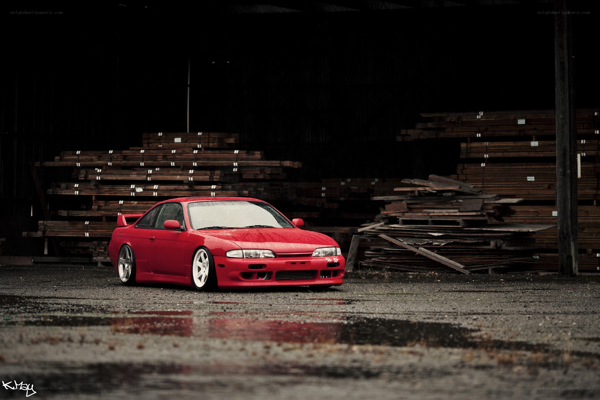 Red car in a warehouse