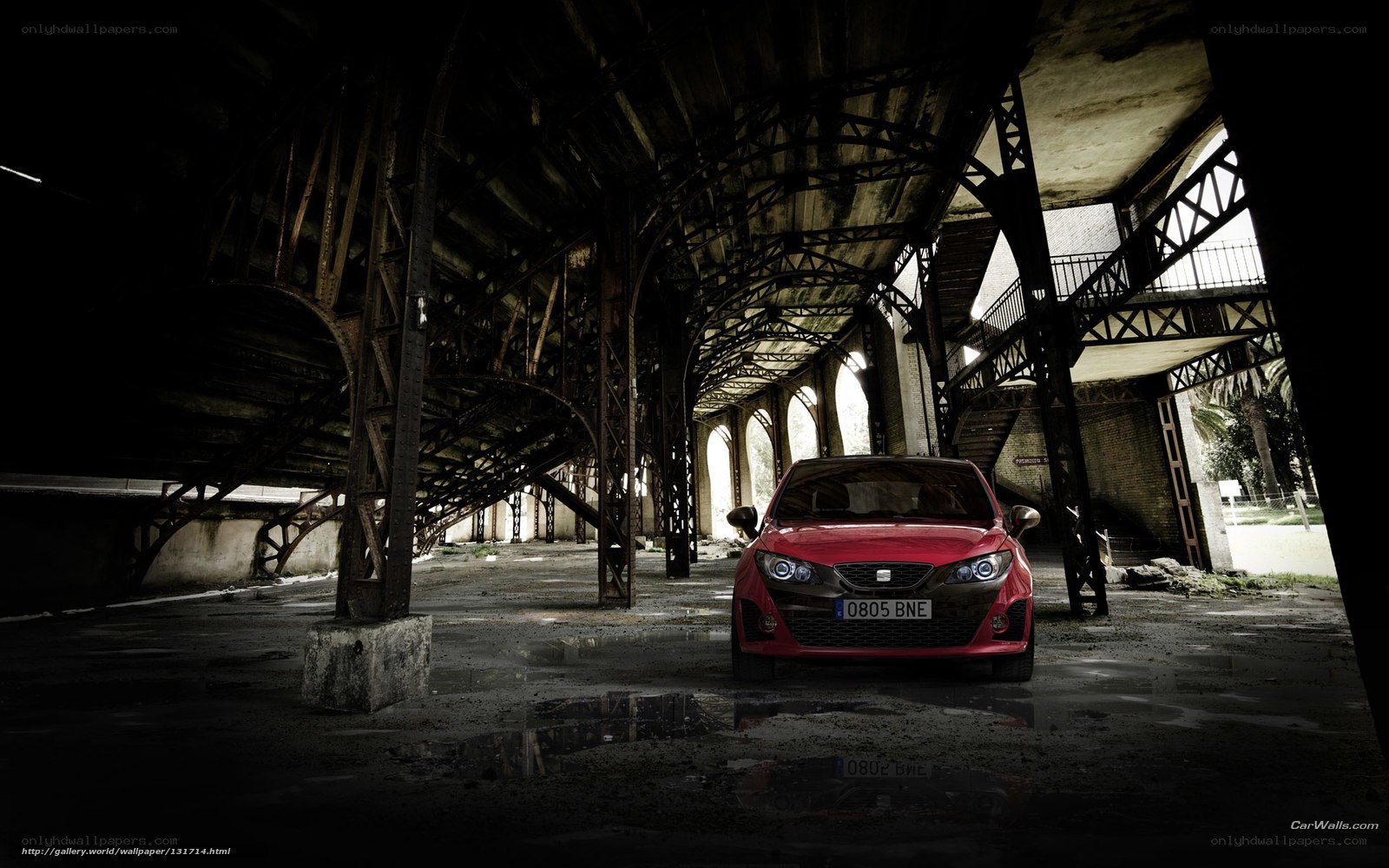 Red car in abandoned building