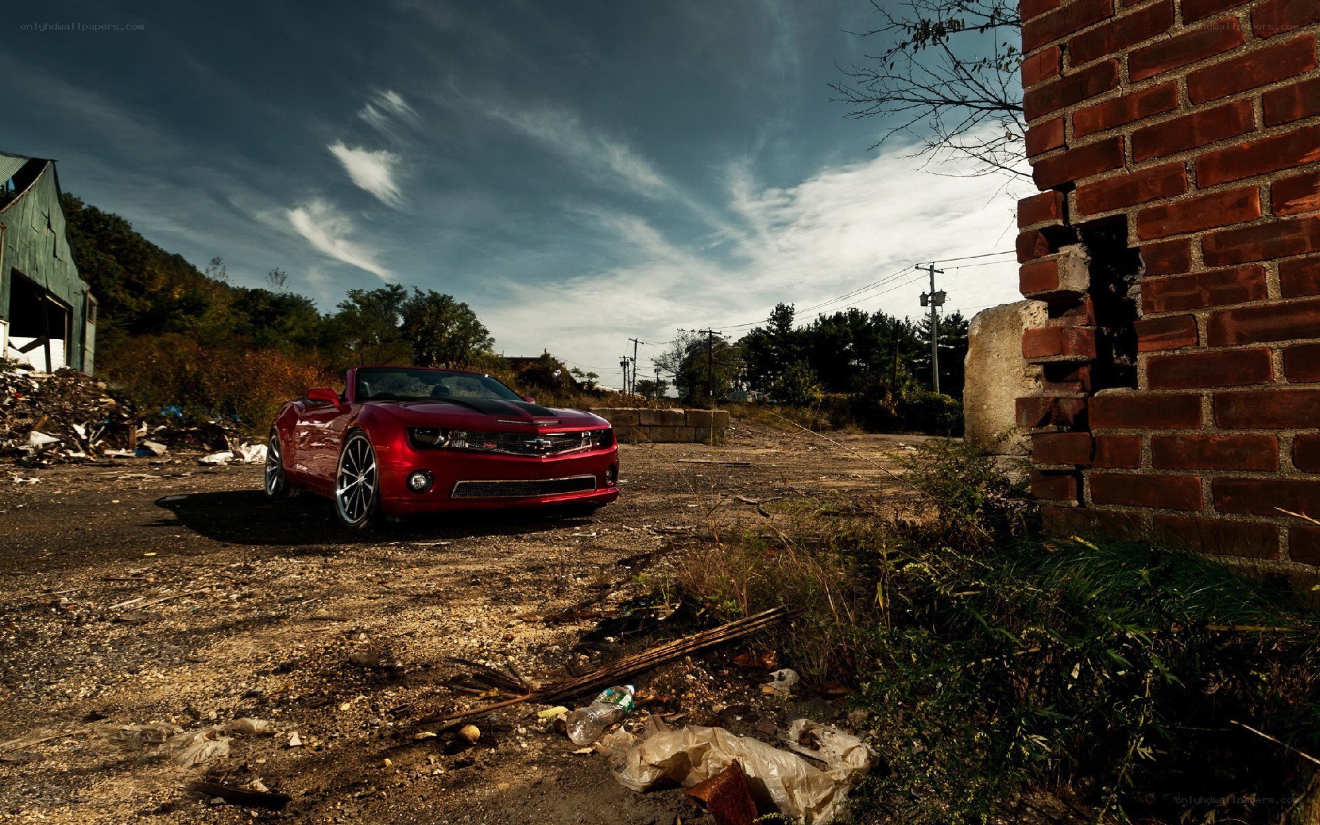 Red car in abandoned lot