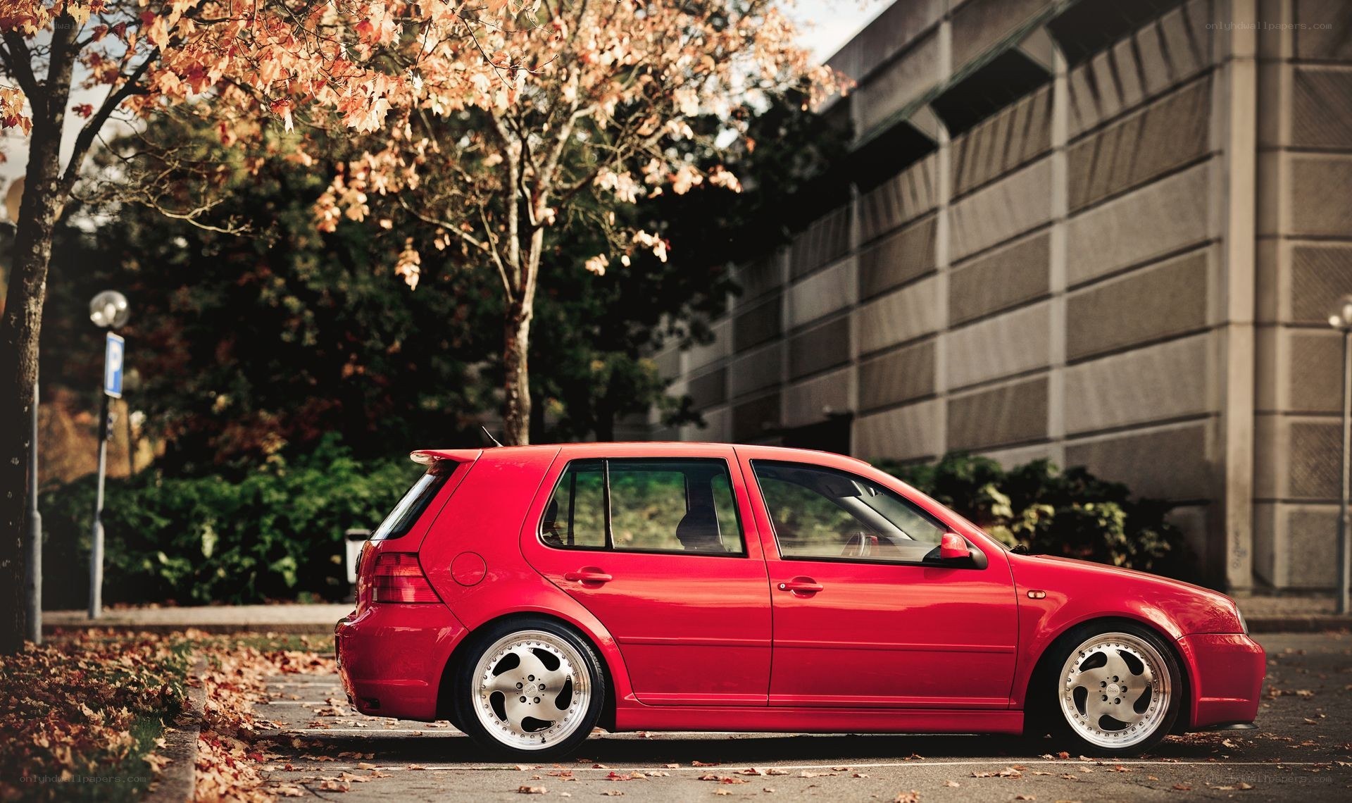 Red car in autumn setting