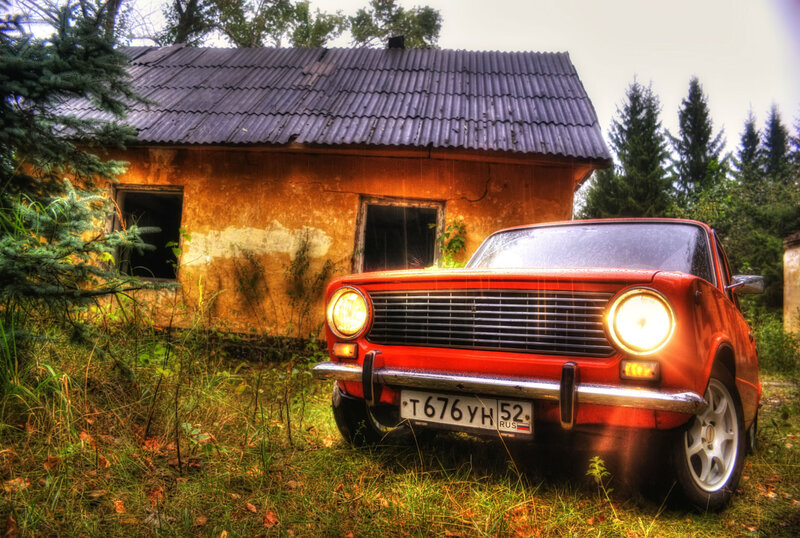Red Car in Grass