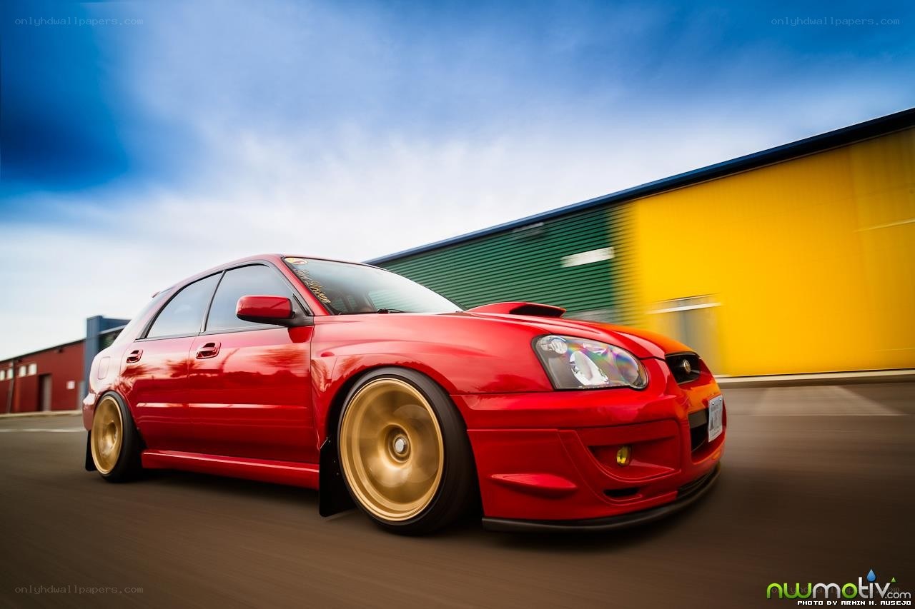 Red car in motion