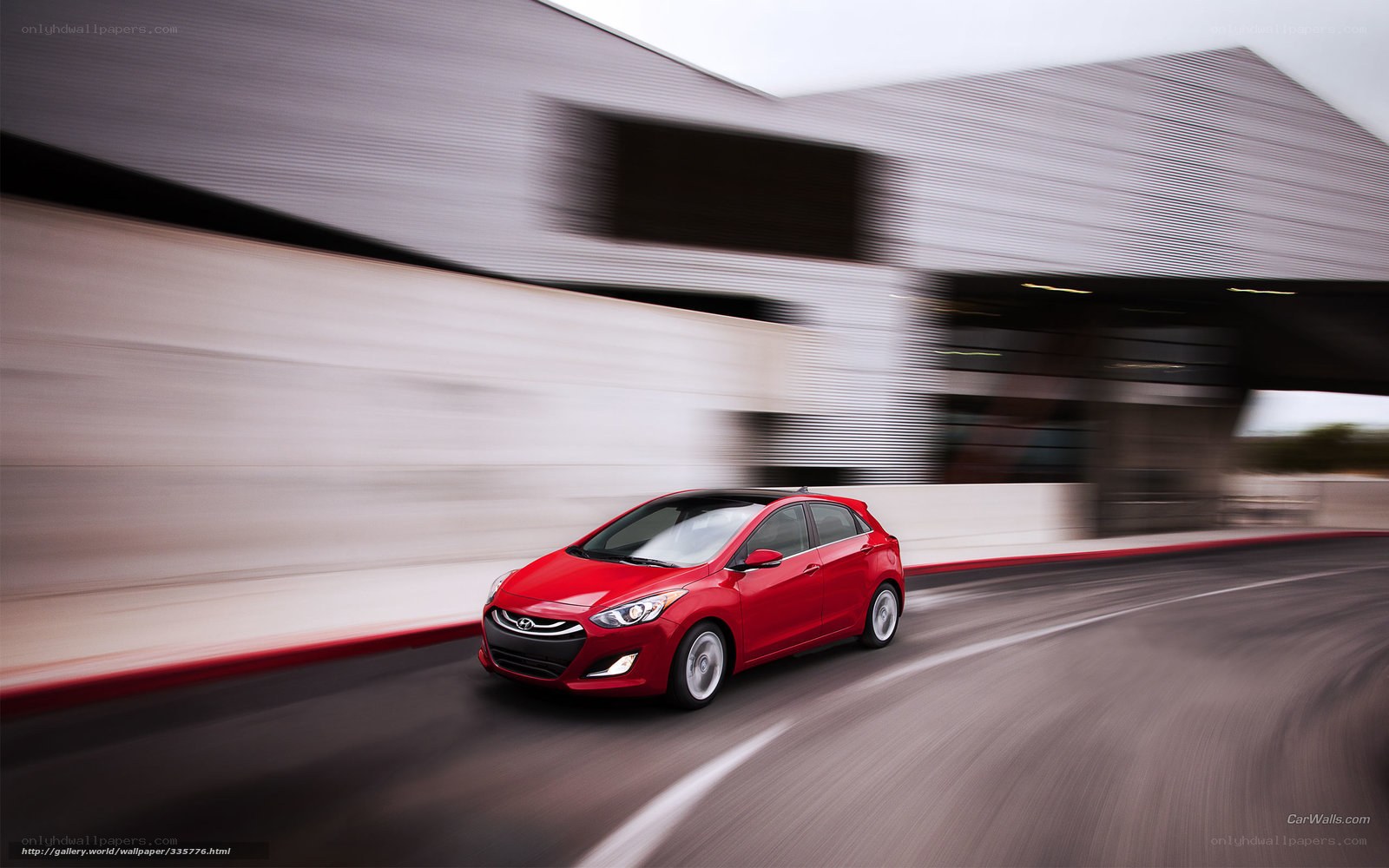 Red car in motion