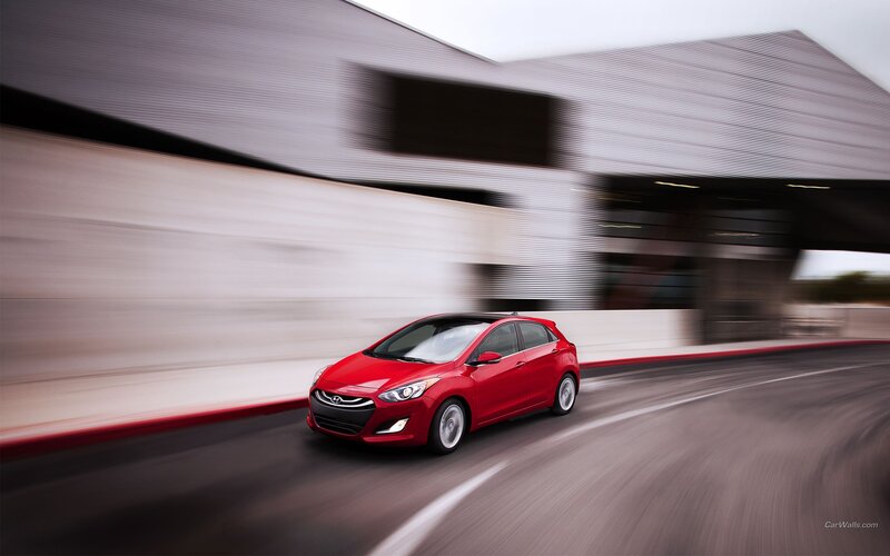 Red car in motion