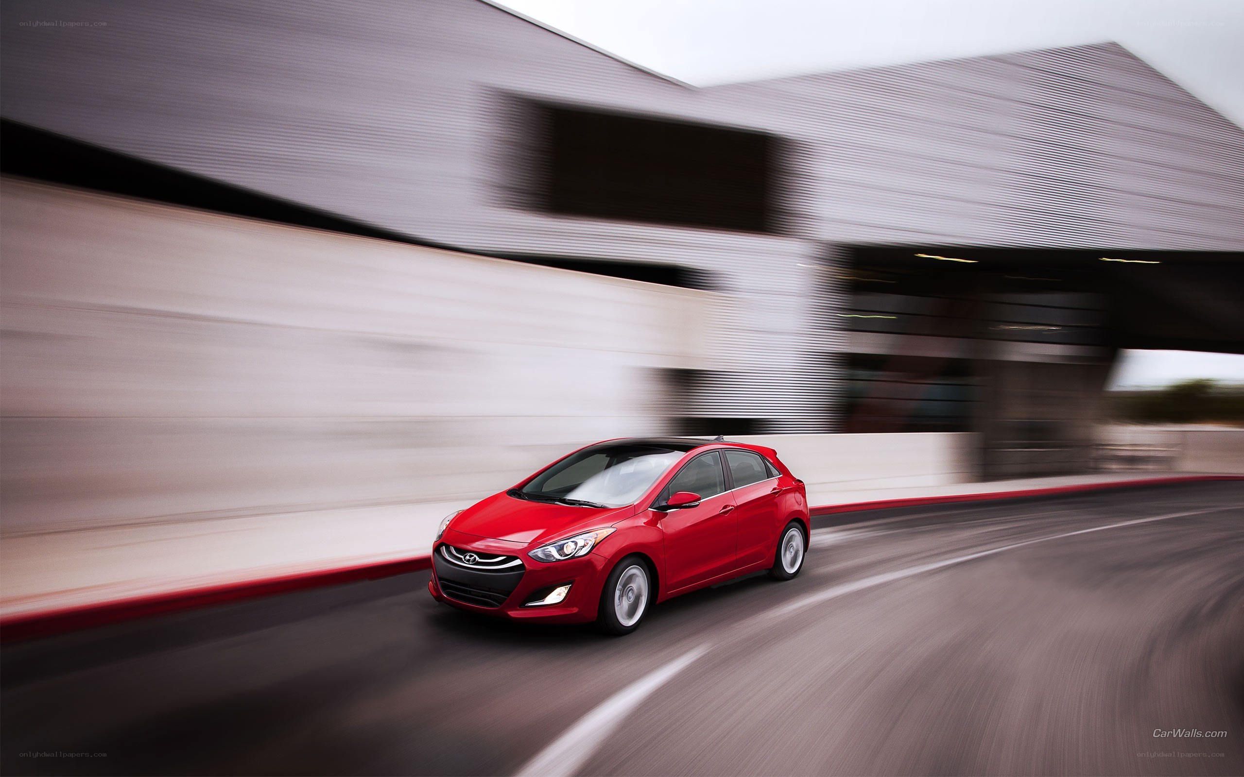 Red car in motion