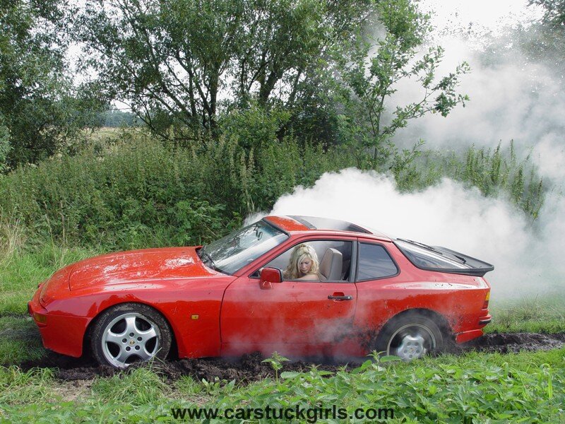 Red Car in Mud