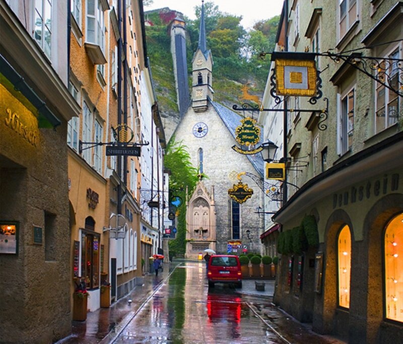 Red Car in Narrow Street