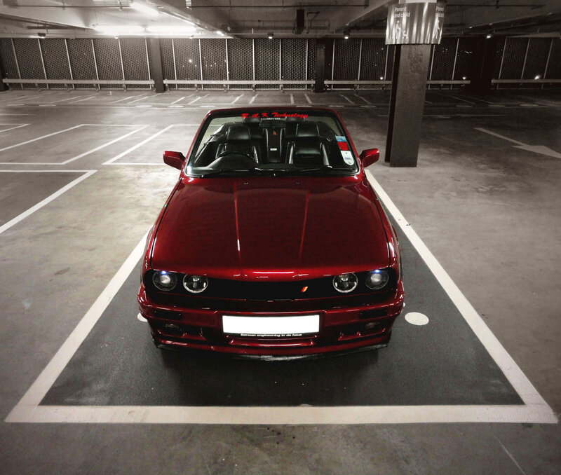 Red Car in Parking Garage — Dramatic, Night
