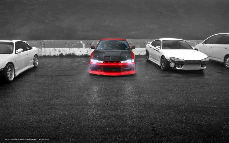 red car in parking lot