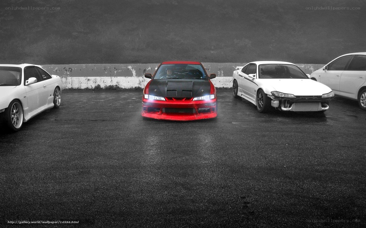 red car in parking lot