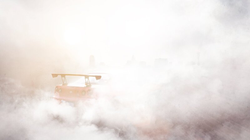 Red Car in Smoke
