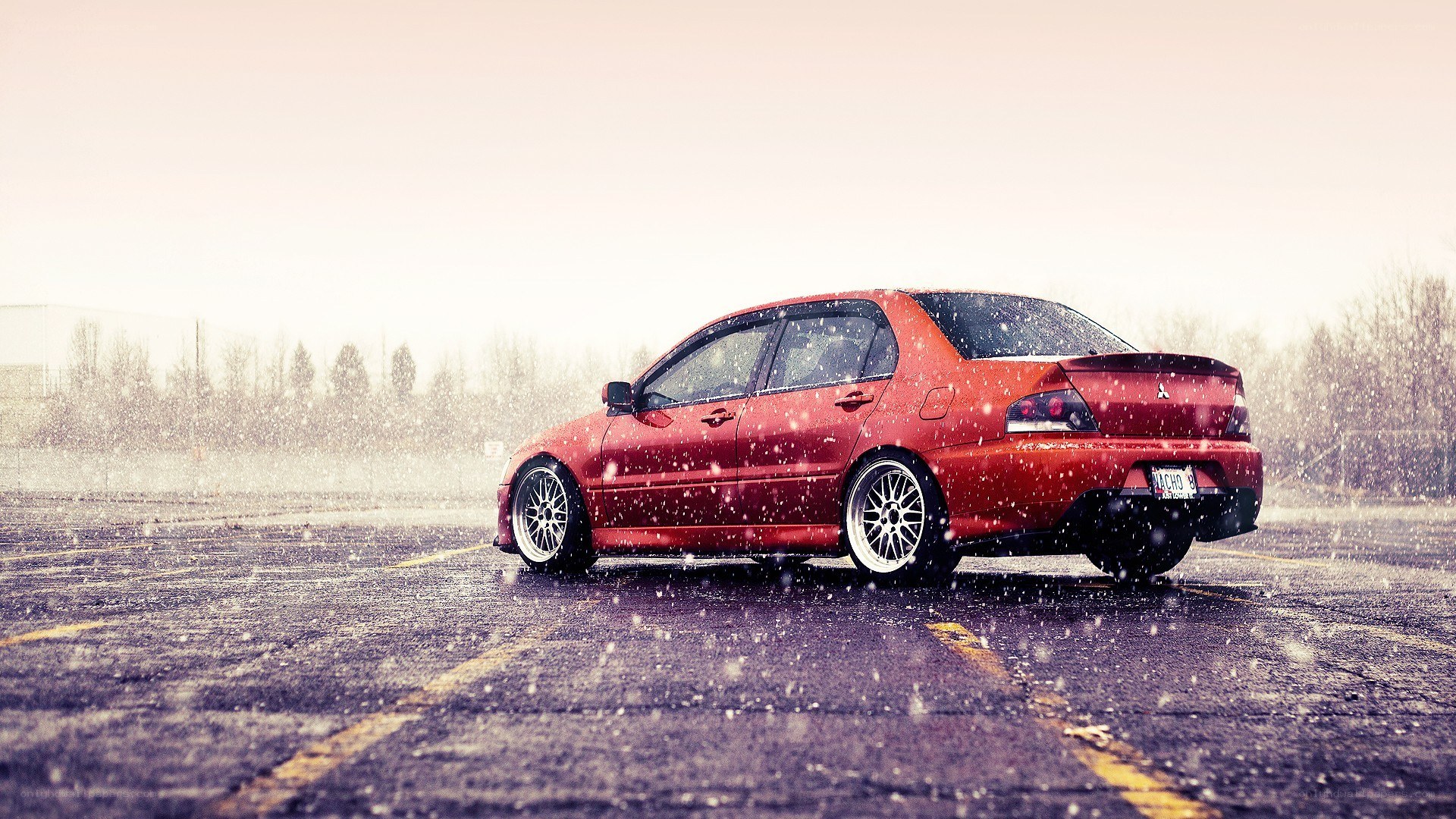 red car in snow